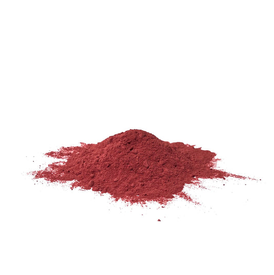 Finely ground beet root powder, red on a white background