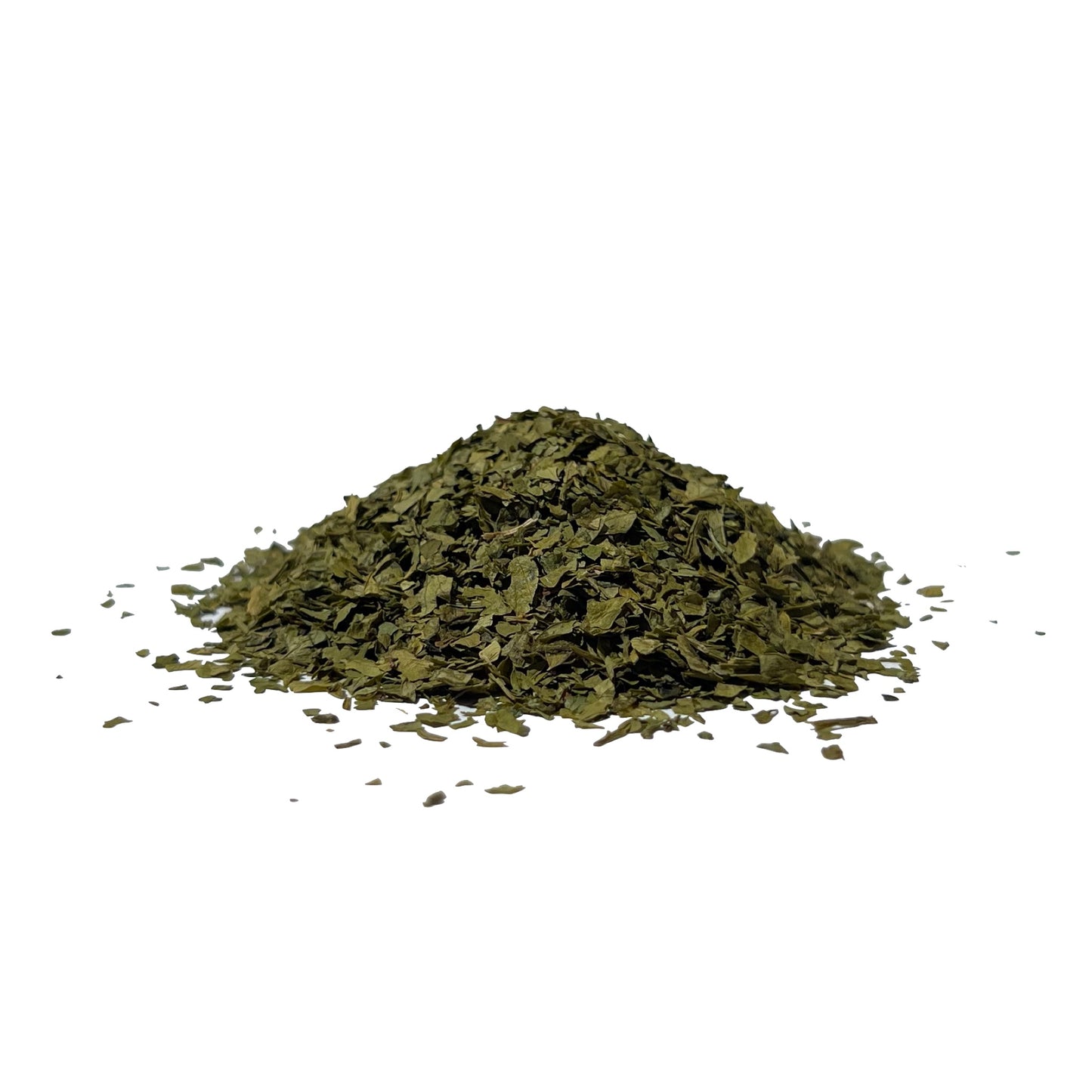 Deep green dried parsley flakes in a pile