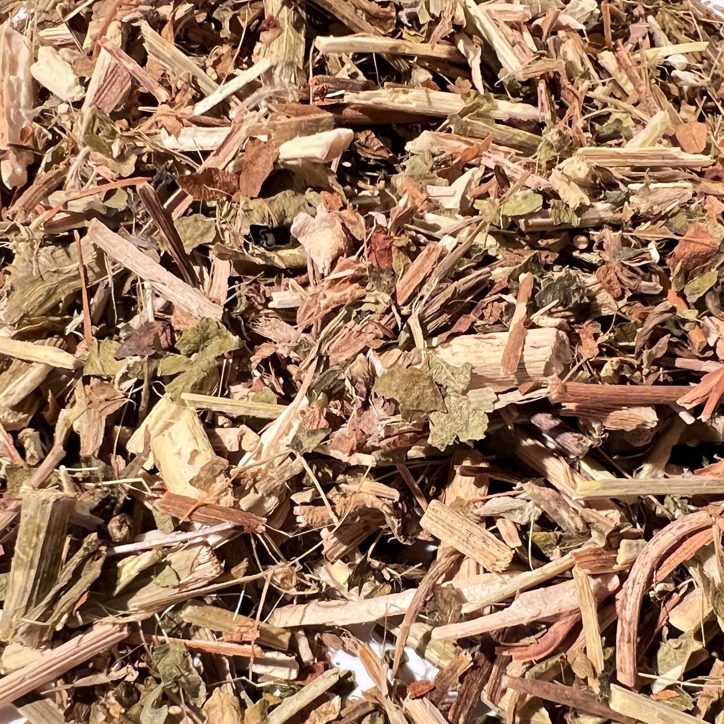Detail of light brown and green dried passionflower herb