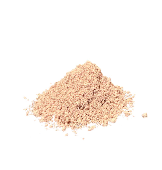 Beige slippery elm bark powder on a white background