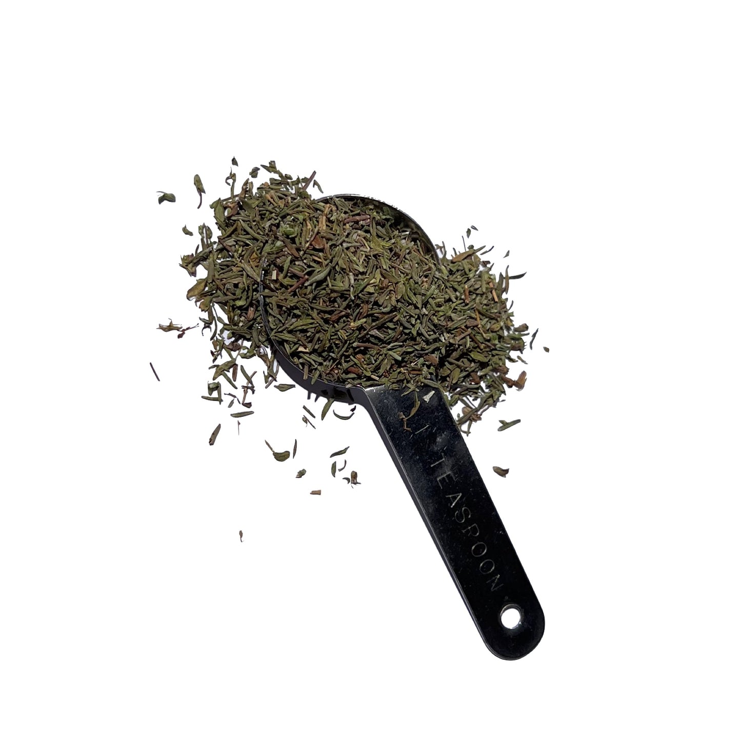 Dried thyme leaves spilling over a metal teaspoon scoop