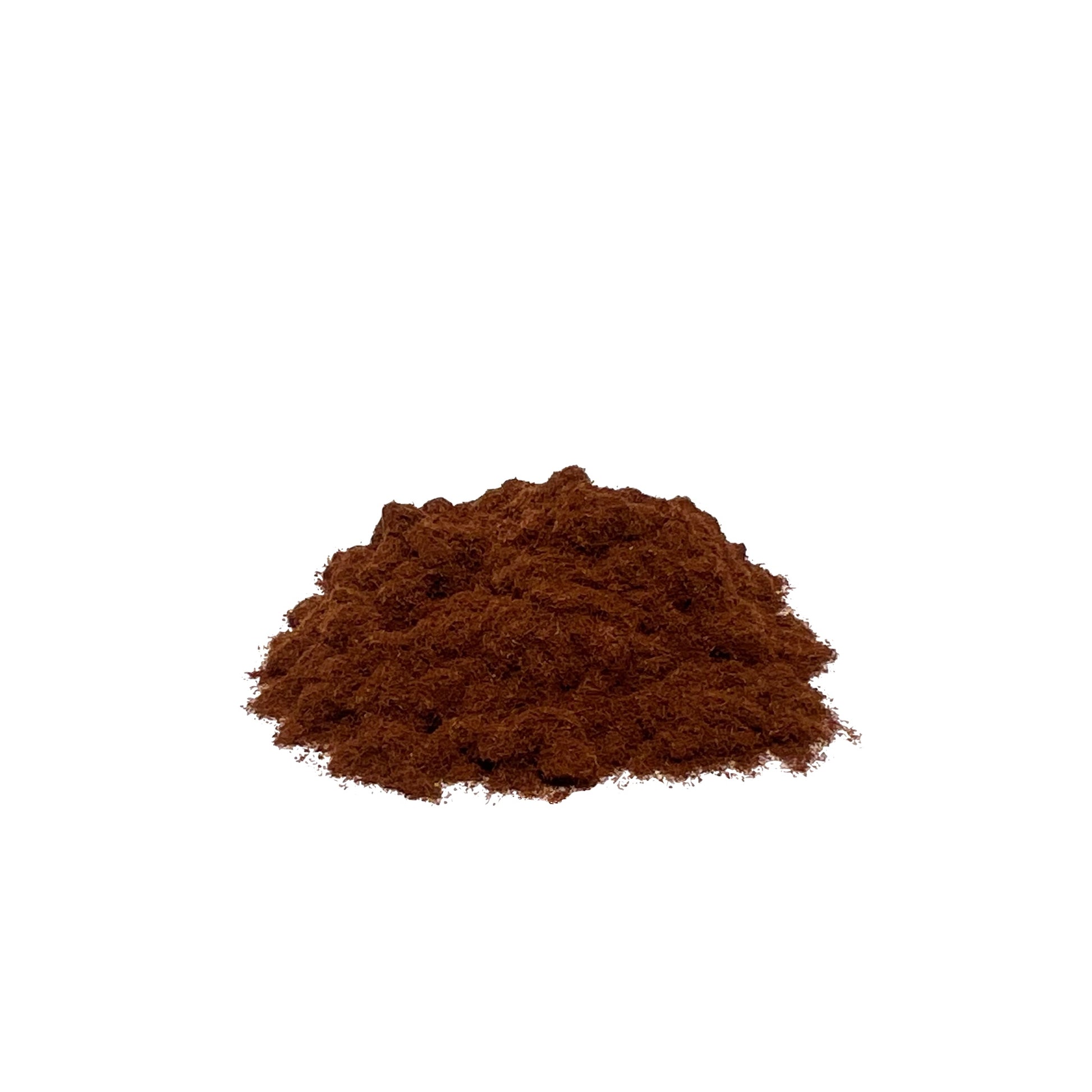 Reddish-brown, sawdust-like yohimbe powder in a pile