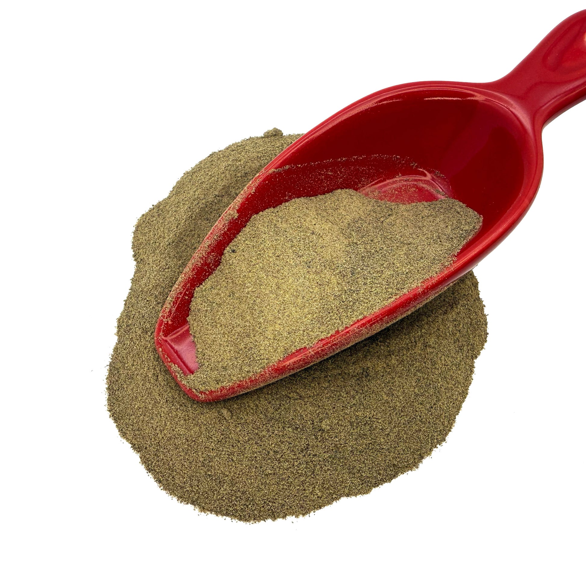 A pile of fine brownish-beige pepper powder on a white background, with a glossy red scoop holding part of the material.