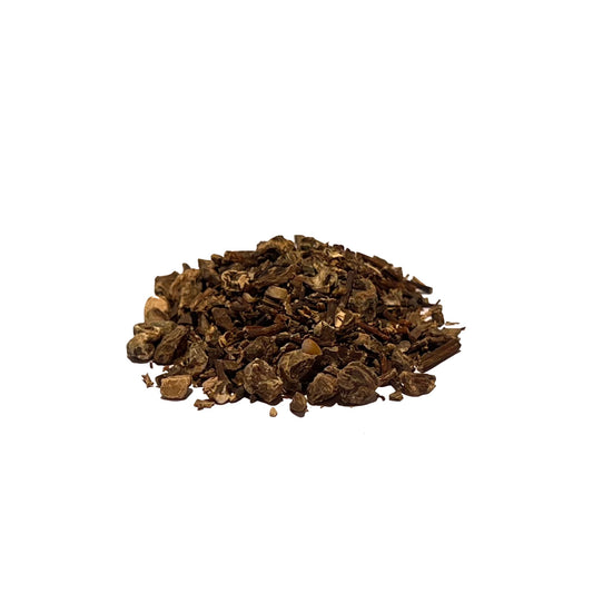 Pile of small brown cuts of black cohosh root on a white background