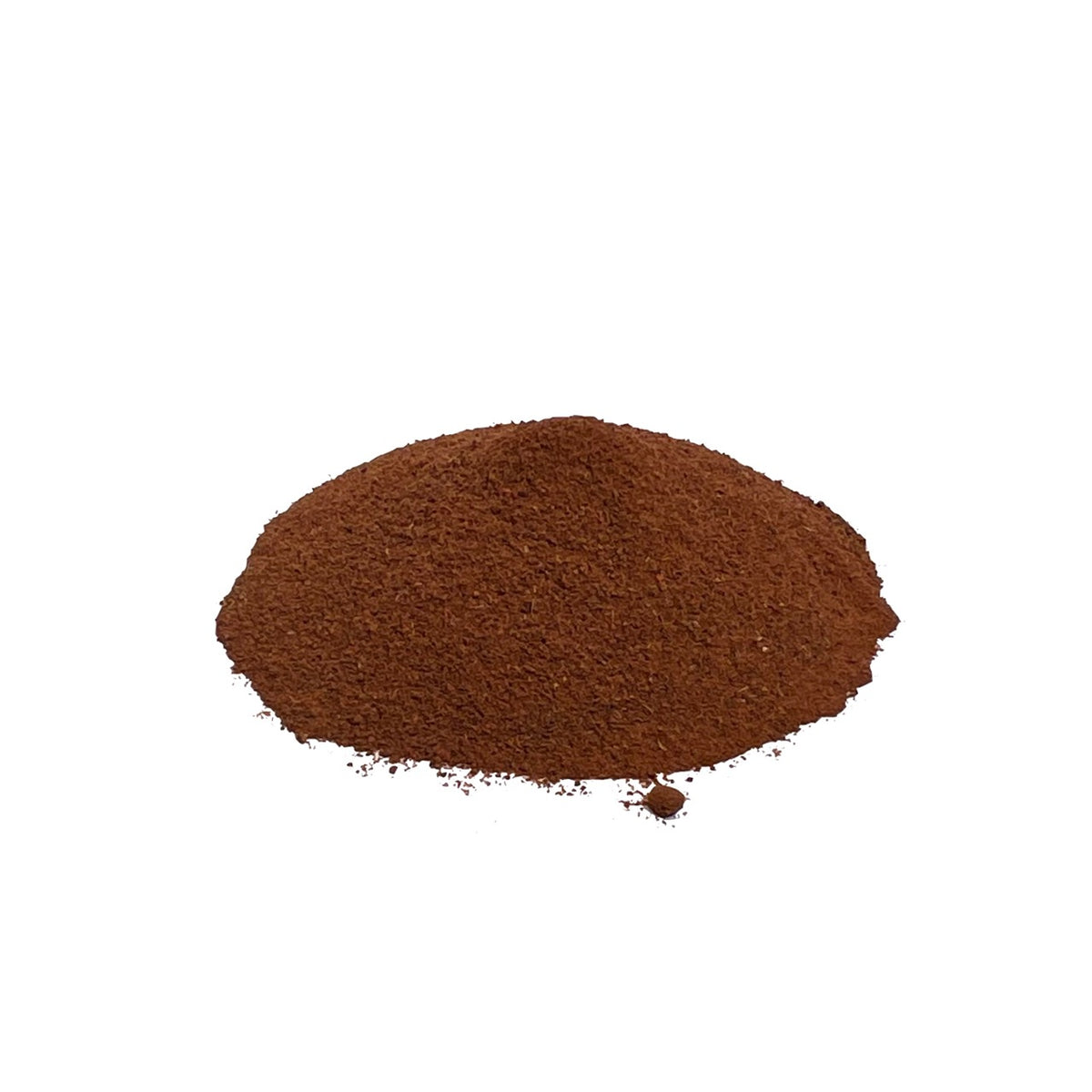 Pile of orangish-brown bloodroot powder on a white background