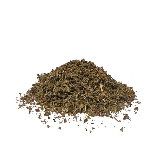 Dried damiana leaf piled on a white background