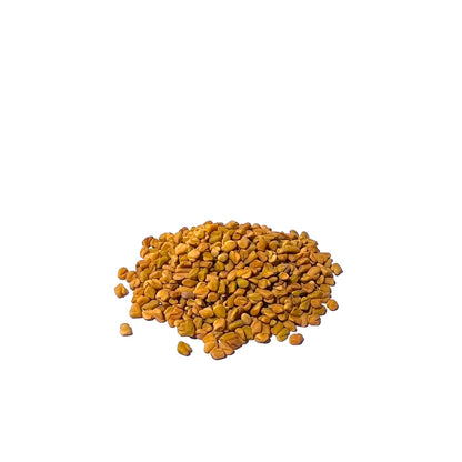 Pile of whole fenugreek seeds on a white background
