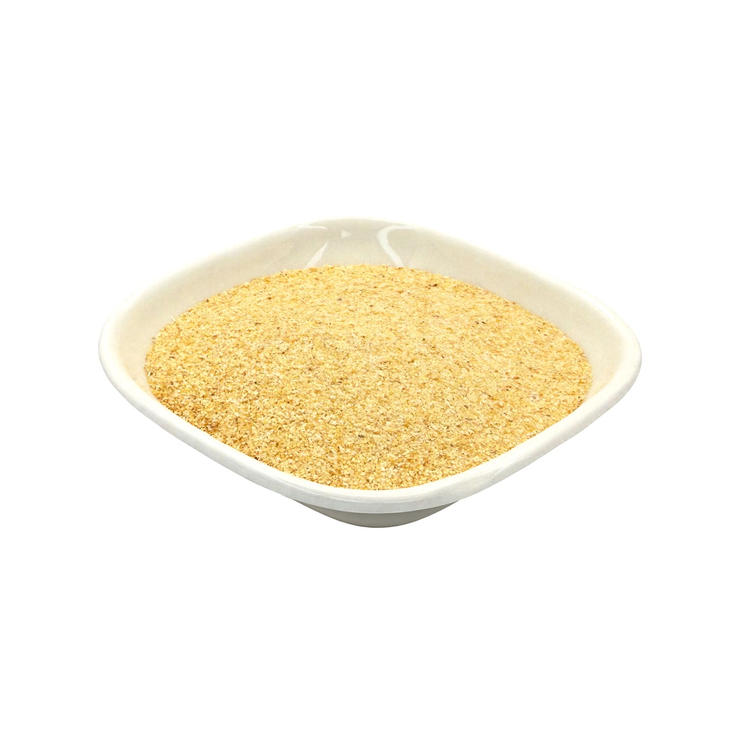 A mound of fine golden-yellow granulated garlic, presented in a small white square dish against a solid white background.