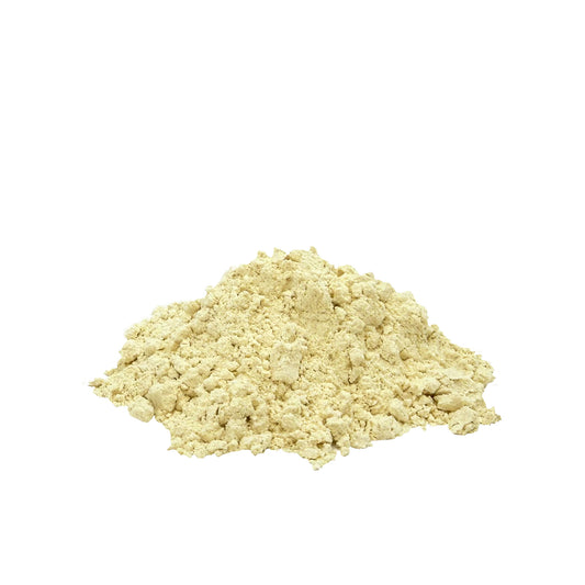 A small mound of pale garlic powder on a plain white background.