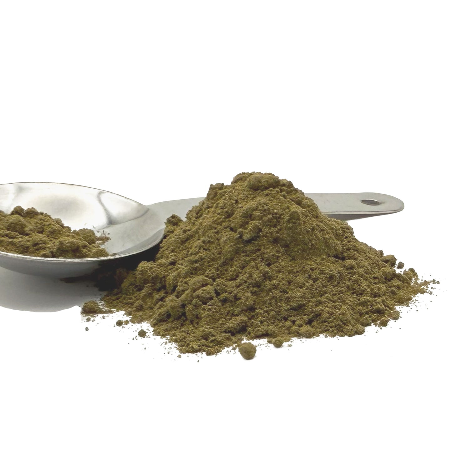 A mound of fine brownish-green powder sits on a white background with a metal scoop holding some of the same powder.