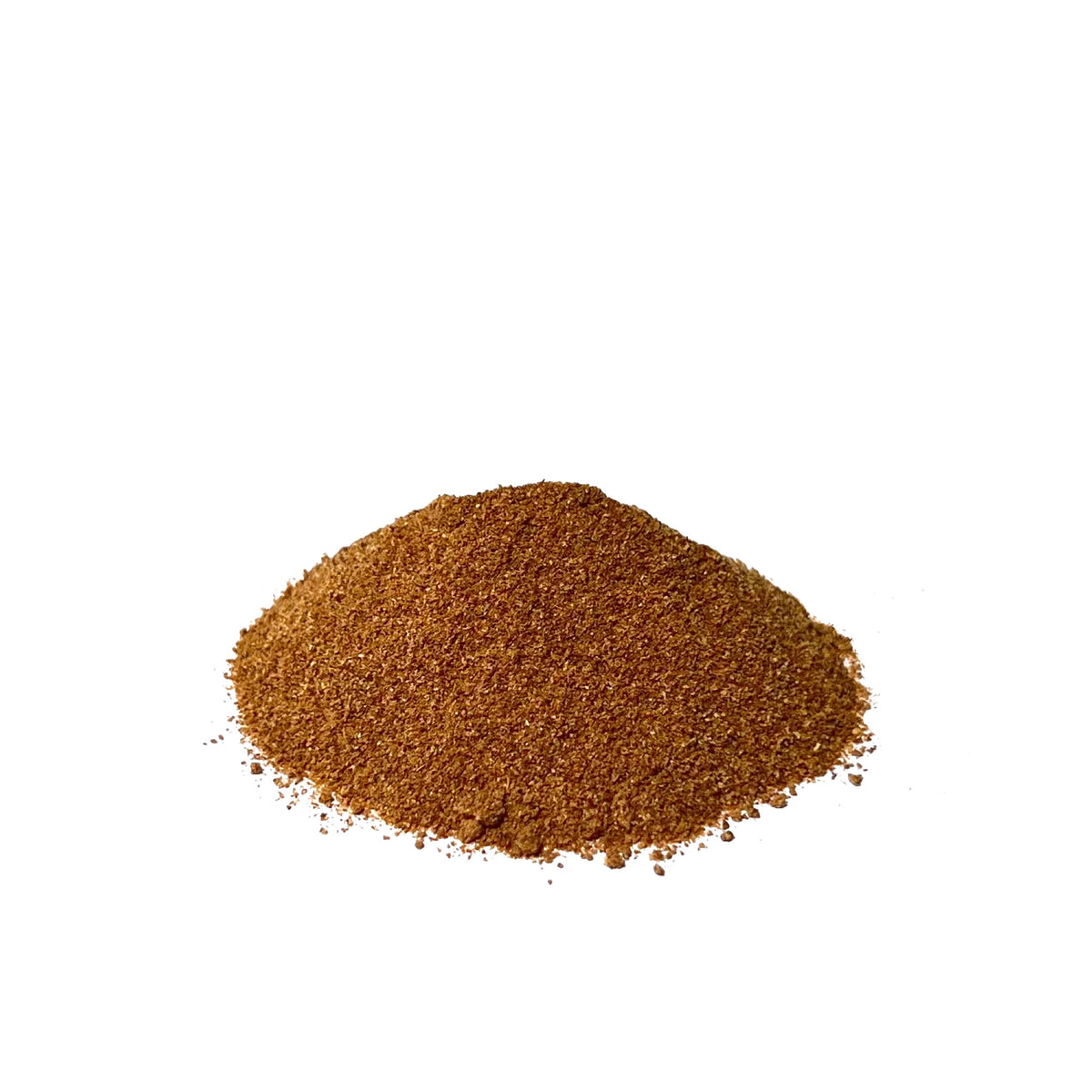 A pile of golden brown dried orange peel powder on a white background
