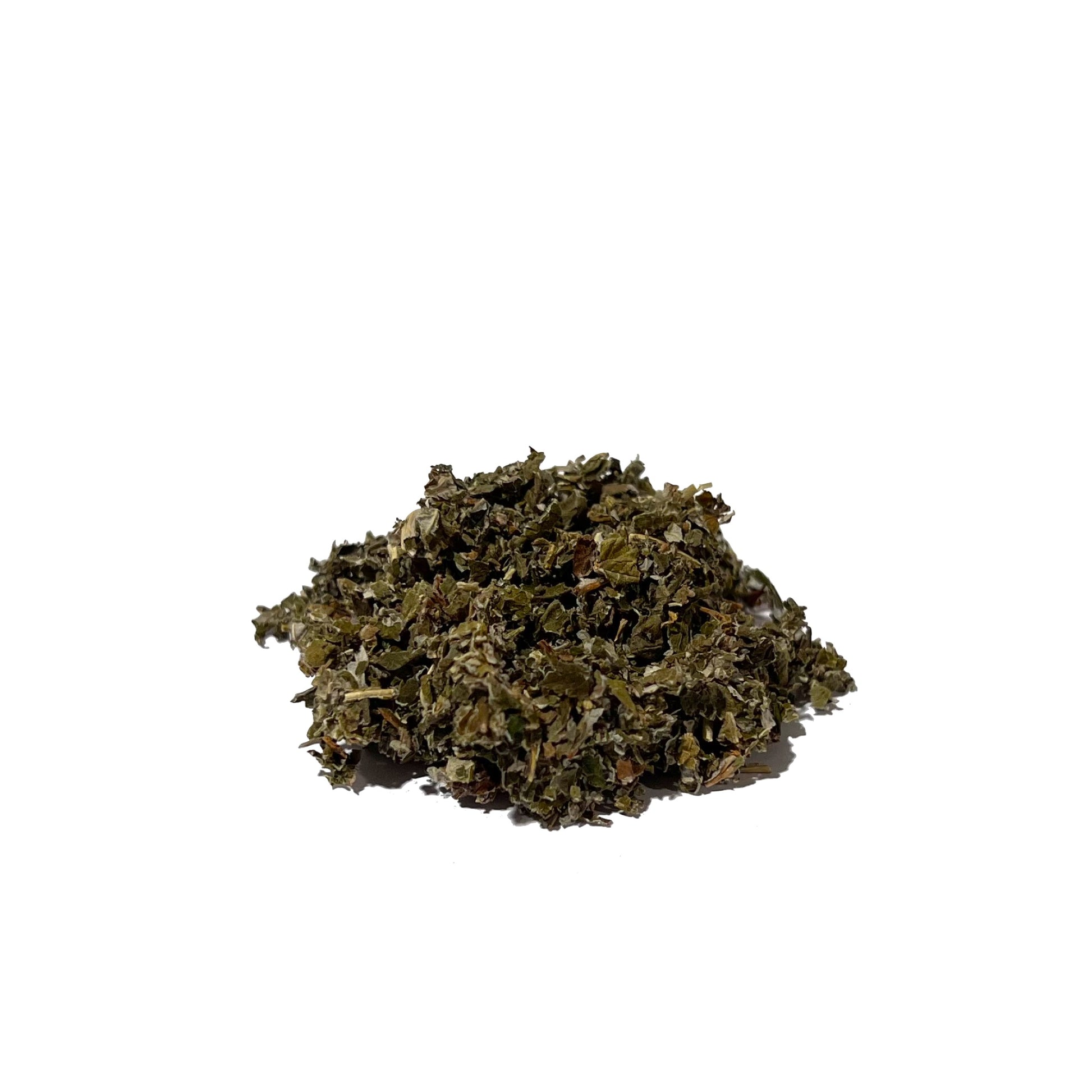 Mound of dark green-brown dried and crumpled leaves