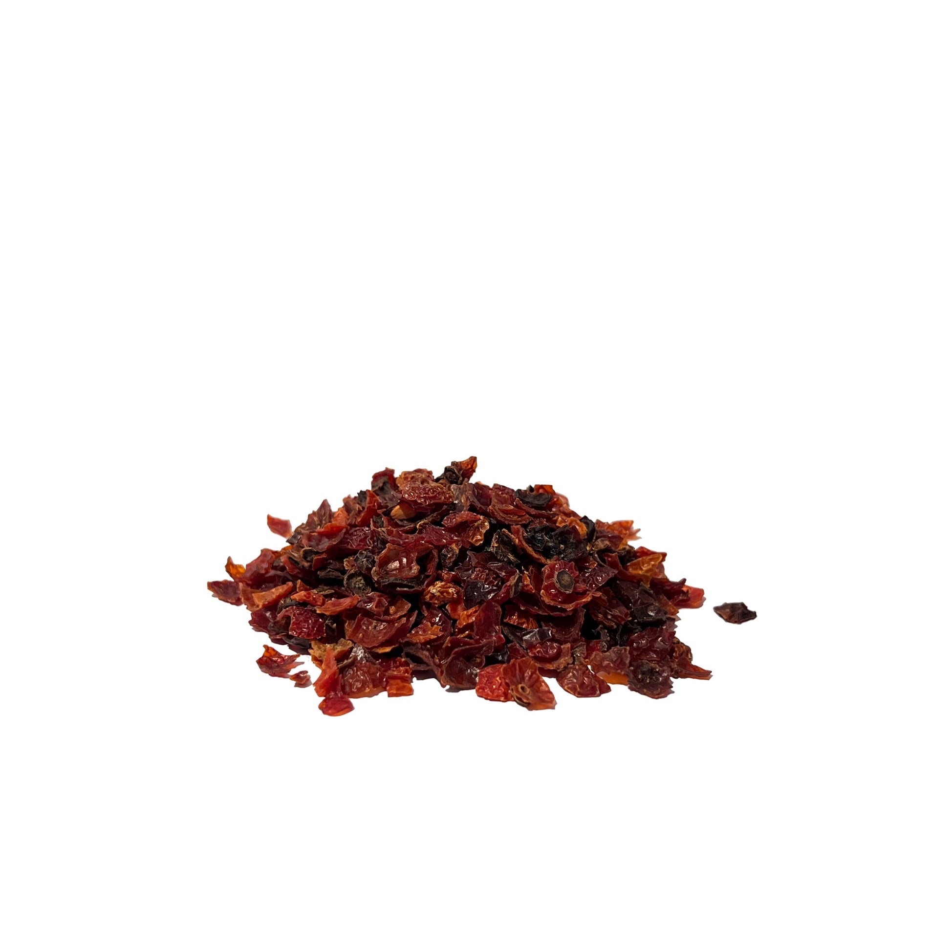 Fleshy cuts of orange-red dried rose hips in a pile