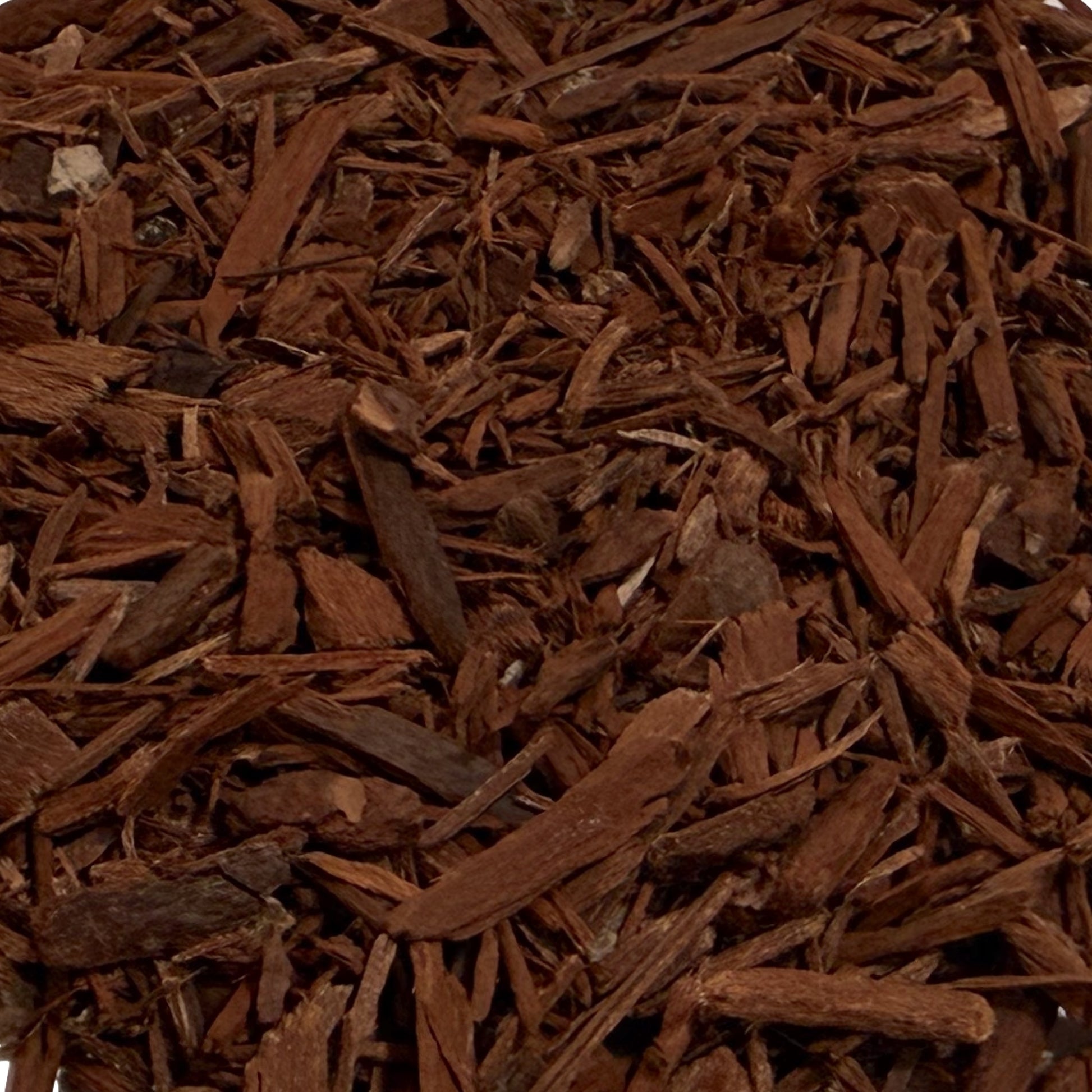 Close up of yohimbe bark cut and sifted pieces