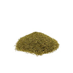 Powdered green herb piled on a white background