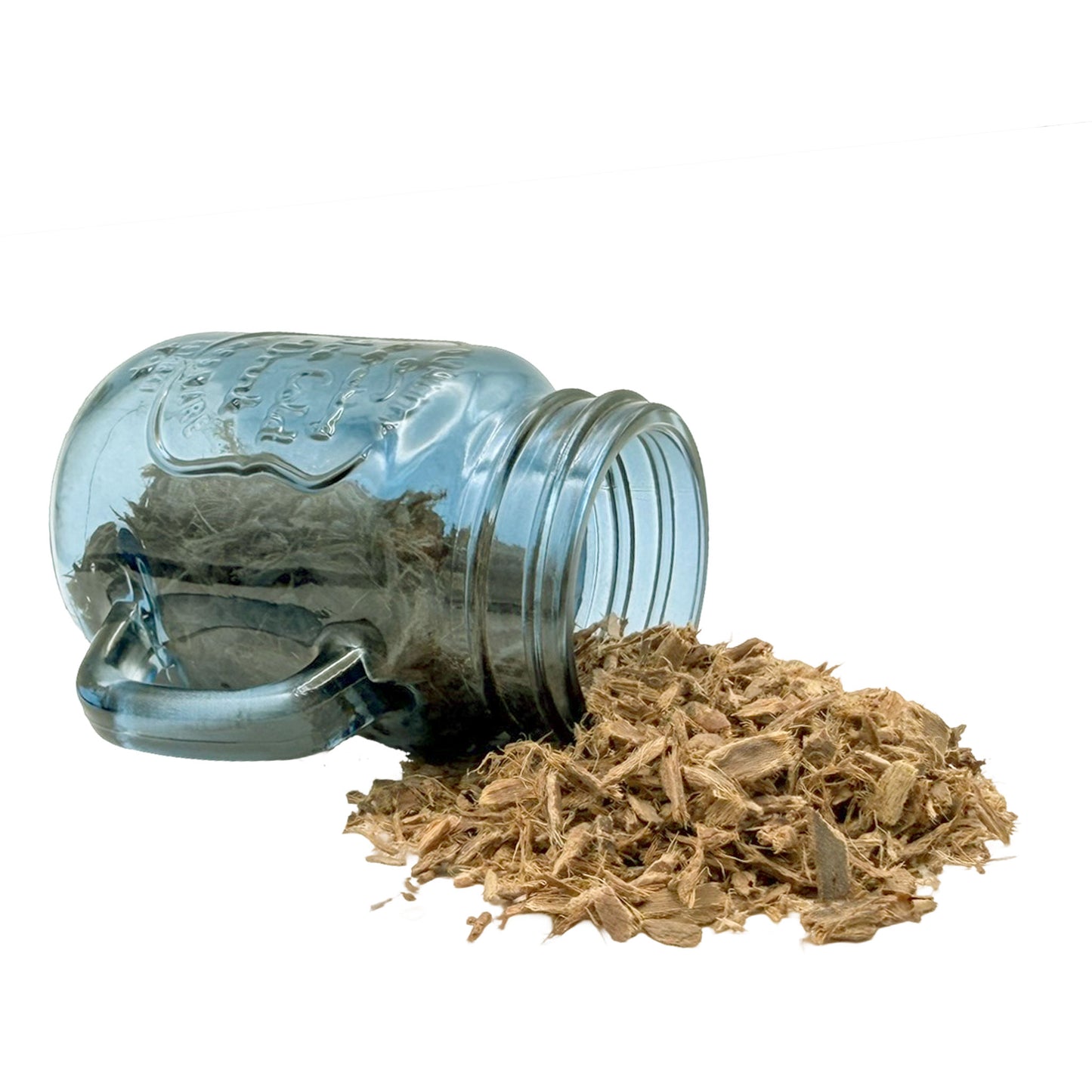 A clear blue glass mason jar with a handle, lying on its side with a pile of light brown bayberry root bark spilling out, photographed on a plain white background.