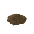 Ground black walnut leaves, piled on a white background