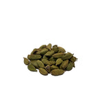 Small pile of dried green cardamon pods.