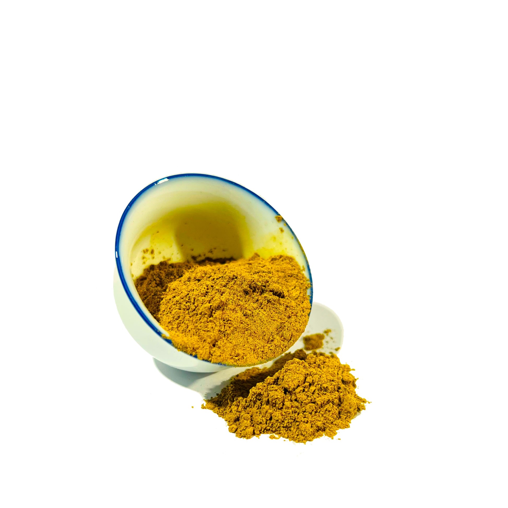 Small blue-rimmed white bowl tipped to pour goldenseal root powder
