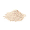 Finely milled Irish moss powder piled on a white background