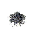 Blue-grey dried lavender flowers on a white background