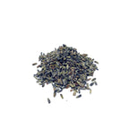Blue-grey dried lavender flowers on a white background