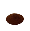 Pile of finely ground, reddish brown pau d’arco bark