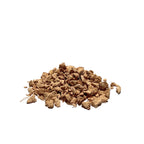 Tan bits of dried pleurisy root piled on a white background