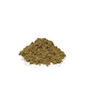 Ground yellow-green raspberry leaves in a clumpy pile