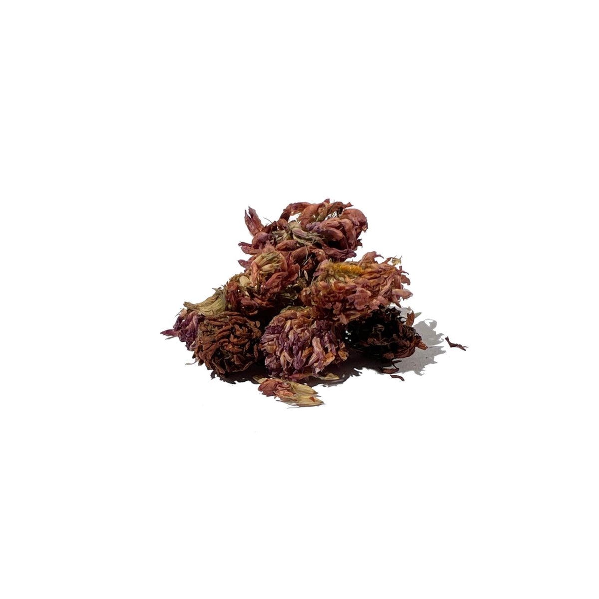 Several whole dried pink and purple flower blossoms in a pile
