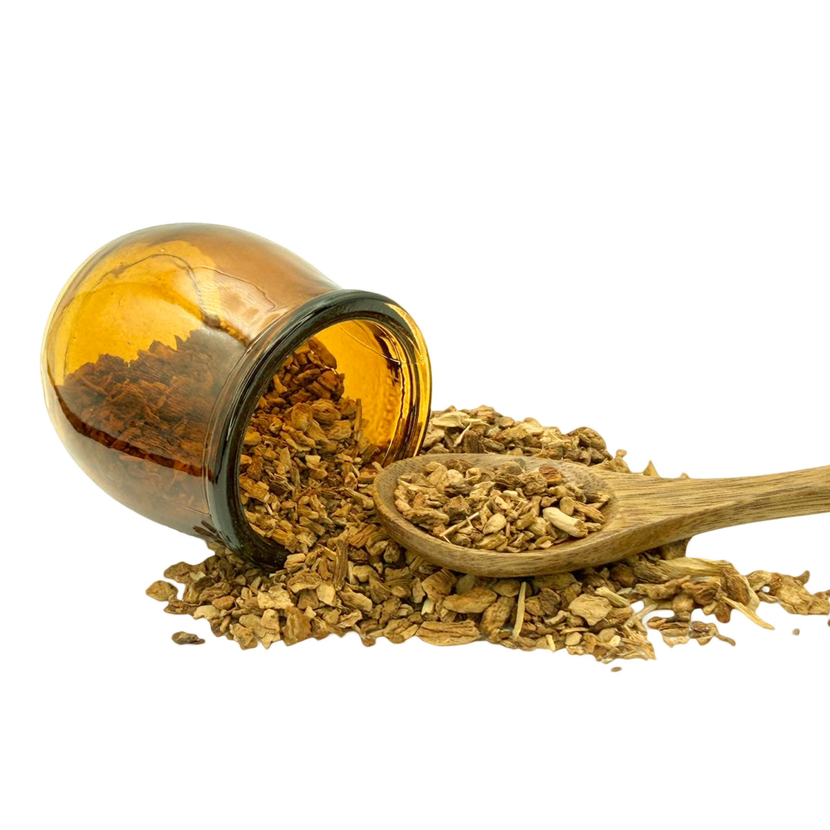 Amber glass jar tipped on its side with dried brown sarsaparilla root pieces spilling onto a white surface, with a wooden spoon holding some of the contents.