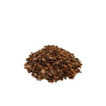 Pile of wild cherry bark chips in shades of dark brown, reddish brown, and tan