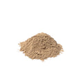 Fine beige wild yam root powder piled on a white background