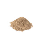 Fine beige wild yam root powder piled on a white background