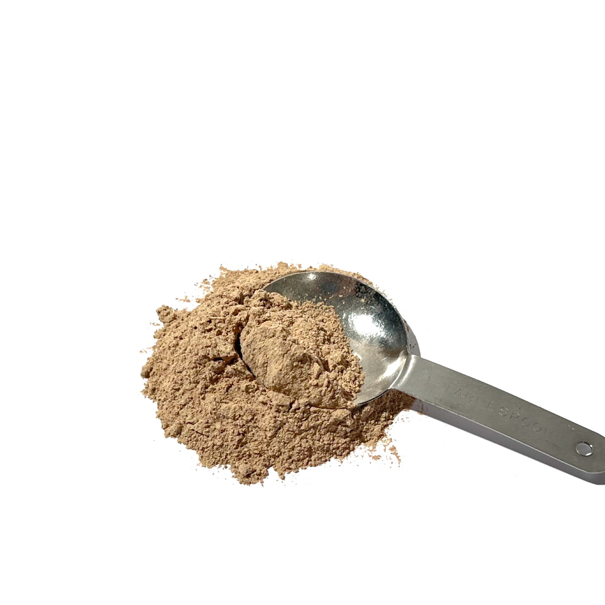 A tablespoon of wild yam root powder with a measuring spoon