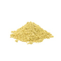 A small mound of pale yellow mustard powder centered on a plain white background.