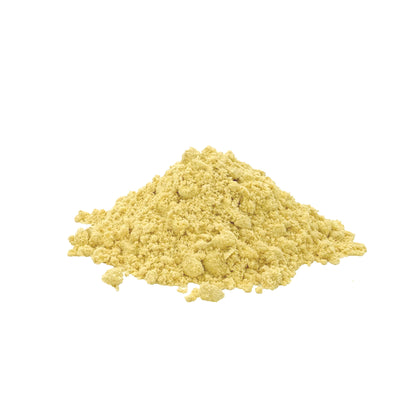 A small mound of pale yellow mustard powder centered on a plain white background.