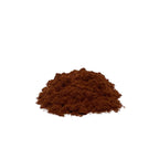 Reddish-brown, sawdust-like yohimbe powder in a pile